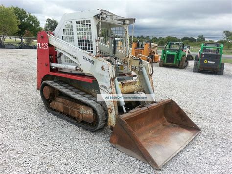 moving a takeuchi tl126 skid steer without power|how to tow a skid steer.